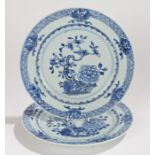 Near pair of Chinese porcelain plates, Qing Dynasty, with a central tree and flower design, dragon