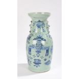 Chinese porcelain vase, in celadon and blue enamels decorated with sacred objects, 43cm high