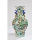 Chinese Canton porcelain vase, Qing Dynasty, decorated with figural and pagoda scenes flanked by