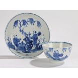 Chinese porcelain tea bowl and saucer, Qing Dynasty, 18th Century, in blue and white with two