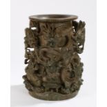 Chinese hardwood brush pot, of large proportions, the deeply carved green hardwood body with dragons