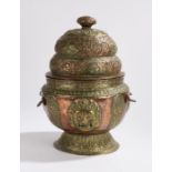 Burmese 19th Century copper and brass container, with a domed lid with flowers and animals above a