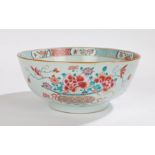 Chinese porcelain famille rose bowl, Qianlong, decorated in enamels with baskets of flowers, vases