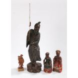 Collection of Chinese carved figures, to include a standing figure, 61cm high, another standing