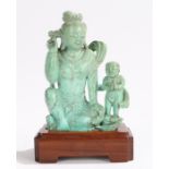 Chinese turquoise figural carving, depicting a crouched female figure and a boy with his hands