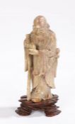 Japanese marble figure, carved as an elderly man holding his cane, 16cm high