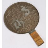 Japanese Edo period bronze hand held mirror, with storks around a blooming tree and Japanese text,