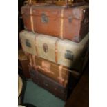 Four early 20th Century travel trunks, of varying sizes, the largest 94cm wide (4)