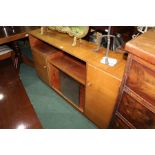 Castle Furniture teak sideboard, with open recess above to sliding glass doors, flanked by two