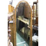 Edwardian mahogany cheval mirror, with a bevelled mirror, supported on square supports and arched