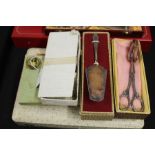 Cased cutlery, to include teaspoons, cake forks, cake servers etc. (6)