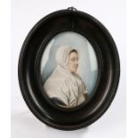 George III portrait miniature, of a lady with a lace cap and white top, oil on ivory, 70mm x 90mm