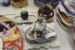 Collection of pottery and porcelain, to include a Staffordshire pottery pepper, stone ware jugs,