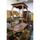 20th Century window table supported by sabre legs, joined by an under tier, 61cm x 40.5cm,