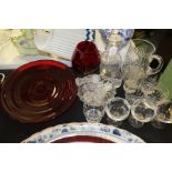 Glassware, to include ruby circular dish, ruby balloon glass, water jug, knife rests etc. (qty