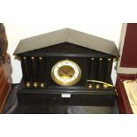 Edwardian slate mantel clock, of architectural form, with triangular pediment, the white dial with