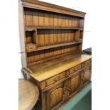18th Century style oak dresser, the plate rack with two shelves flanked by two small drawers, the
