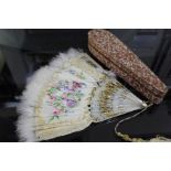 Mother of pearl and ostrich feather fan, with gilt decorated pierced sticks, AF