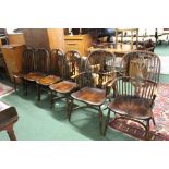 Set of six Windsor style oak chairs, with pierced splats and spindle back supports above moulded