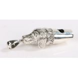 Silver whistle in the form of a dogs head