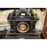 Edwardian slate mantel clock retailed by J Haskell of Ipswich, the architectural case with