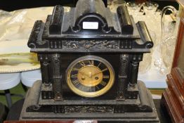 Edwardian slate mantel clock retailed by J Haskell of Ipswich, the architectural case with
