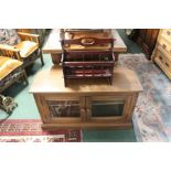 20th Century television cabinet, with two glazed doors enclosing one adjustable shelf together