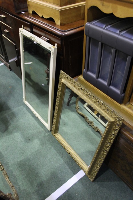 Gilt framed mirror, the pierced border with scroll decorations, 58cm x 68cm together with a