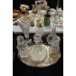 Glass ware to include ships decanter, decanter with pointed stopper, two other decanters, two vases,
