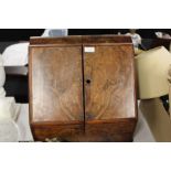 Victorian walnut stationary box, the doors opening to reveal a fitted interior and hinged top