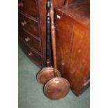 Two Victorian copper bed warming pans, on turned handles, both 108cm long (2)