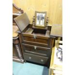 Victorian mahogany bedside chest, the top and front opening to reveal a collapsable mirror, above