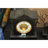 Edwardian slate mantel clock, the triangular pediment above the ivorine dial with Arabic numerals,
