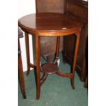 Edwardian circular occasional table, on square out-splayed legs united by a circular undertier,