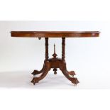 Victorian walnut breakfast table, the oval inlaid top above four turned supports and acanthus leaf