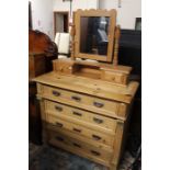 Pine chest of four drawers, raised on ball feet, 99.5cm wide, together with a pine mirror on