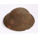 Second World War British Mark II steel helmet, complete with liner, chin strap present but