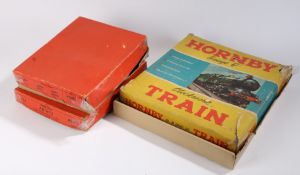 Hornby O gauge model railway, to include two clockwork engine number 45746 with tender, boxed and