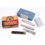 Cigarette lighters and accessories, to include Colibri lighter, cigar cutter and knife with