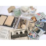 Album containing ten coloured and black and white postcards, black and white photograph of a