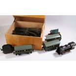 O gauge model railway, to include Marklin R890 clockwork engine and tender, carriages, track (qty)