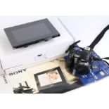 Sony DSC-H9 digital camera, housed in a Sony camera bag, Sony DPF-V700 digital photo frame, boxed (