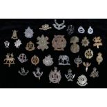 Quantity of reproduction British army cap badges, various regiments and corps, (30)