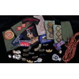 Cap badge, button, and lanyard to the Royal Military Academy Sandhurst together with Army Cadet