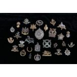 Quantity of reproduction British army cap badges, various regiments and corps, (30)