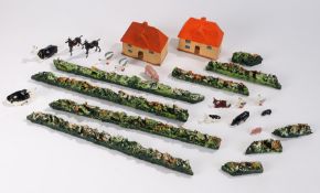 Toy farmyard to include two houses, cows, geese, pigs, horses and a goat. also wooden strips
