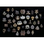 Quantity of reproduction British army cap badges, various regiments and corps, (39)