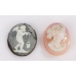 Two carved oval cameos, depicting a putto carrying a bucket, the other depicting a lady in