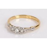 18 carat gold ring set with three diamonds, ring size P, 2.4g