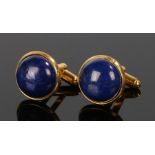 Pair of lapis lazuli cufflinks, with cabochon cut lapis lazuli set to gilt metal